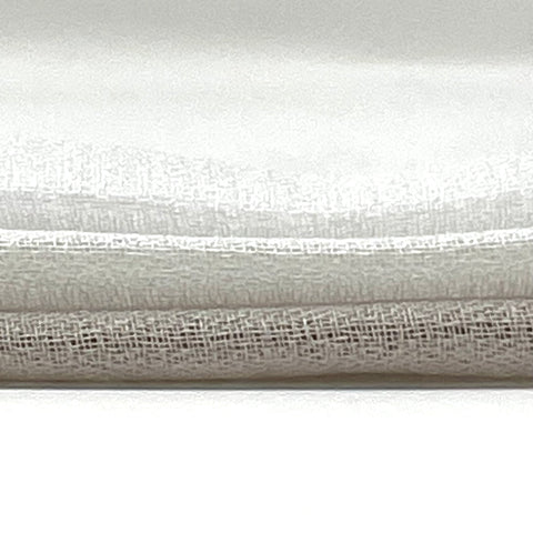 Sheer faux linen fabric with a fine netted weave and soft texture