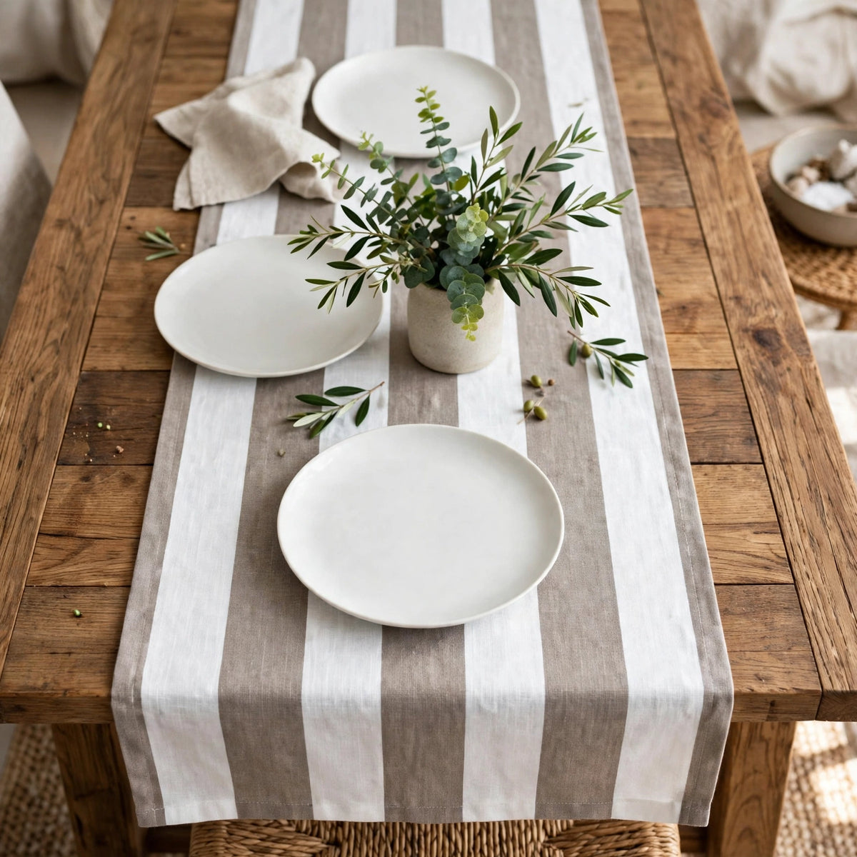 CL1092 linen fabric as a table runner on a styled dining table