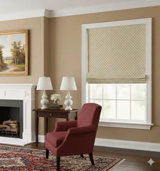 Living room with a red armchair, fireplace, and window with a patterned jacquard flat roman shade.