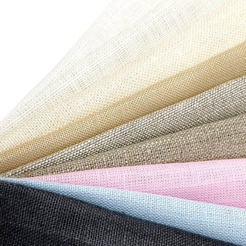 Belgian medium-weight linen fabric in various colors, ideal for home decor and apparel.