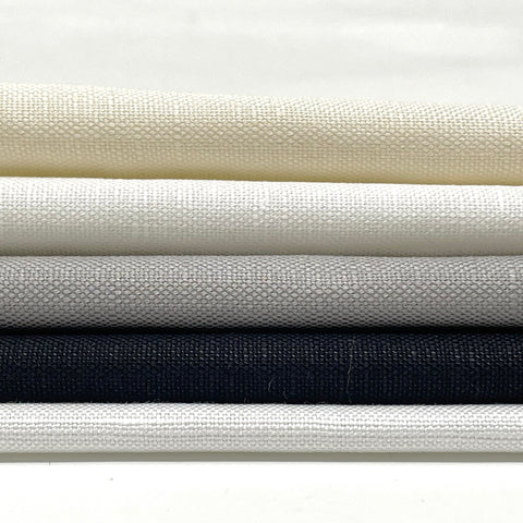 cotton linen blend fabrics in neutral tones ranging from ivory to black