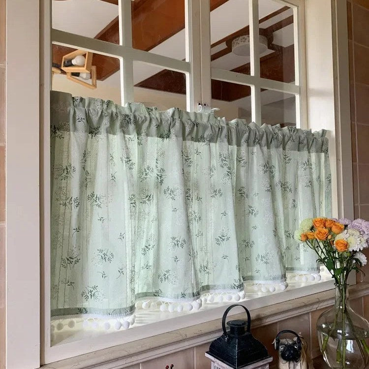 Green cotton daisy café curtain valance on a kitchen window