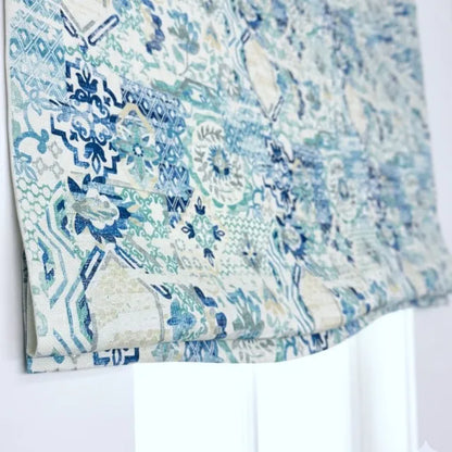 Blue and white patterned fabric on a white background