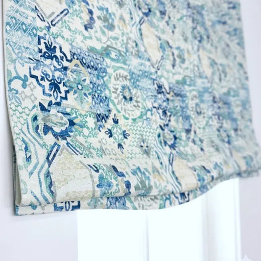 Blue and white patterned fabric on a white background
