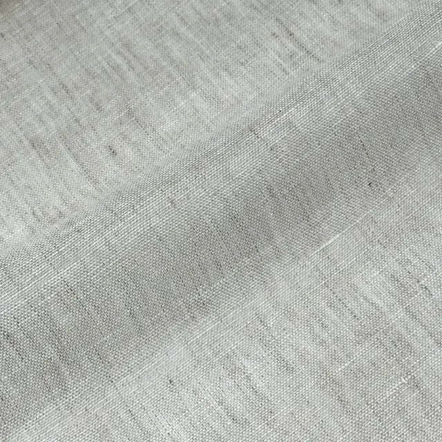 Silver open weave sheer linen fabric close-up with natural slub texture