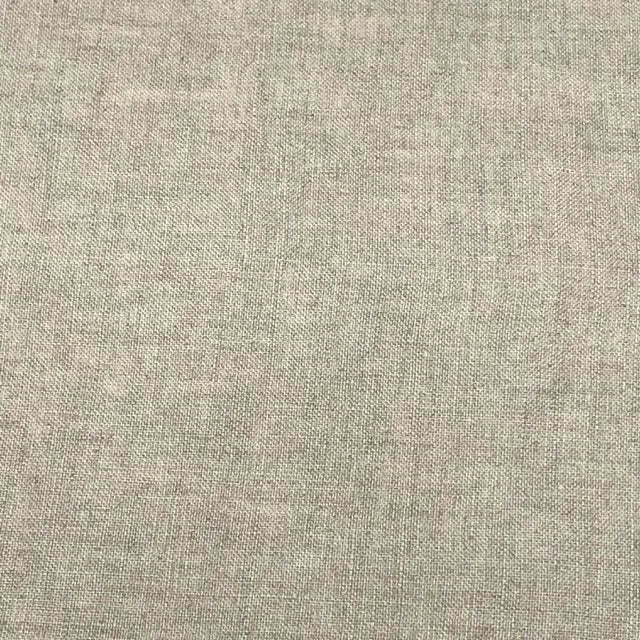 A close-up of a woven fabric texture in a light taupe-beige color, showing the detailed linen-like weave pattern.