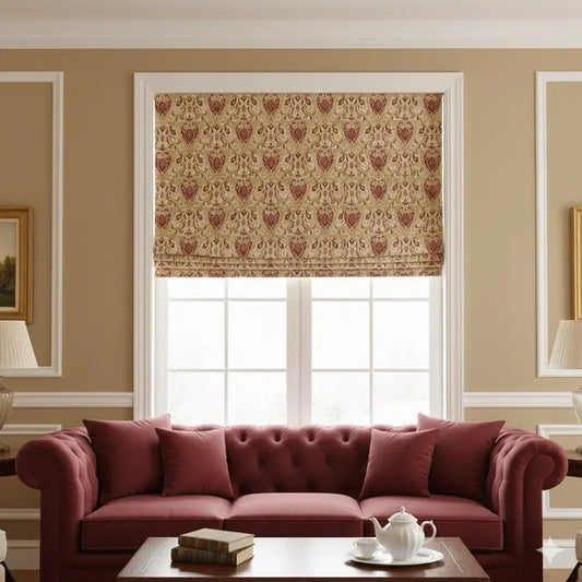 Living room with a red sofa, coffee table, and Classic Medallion Tapestry roman shade.