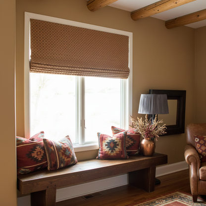 classic jacquard flat roman shade in Cozy corner with a window seat, patterned cushions, and a lamp.