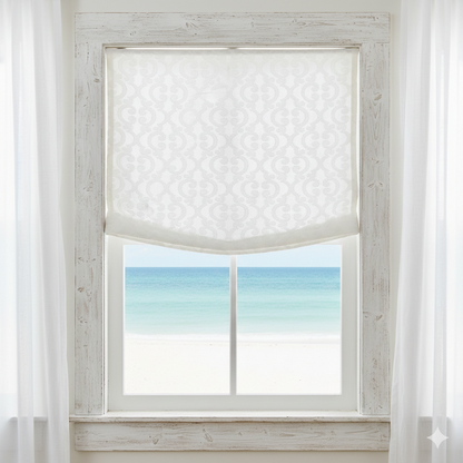 Window with damask linen roman shade and view of ocean