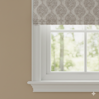 Window with decorative damask cotton roman blind against a beige wall