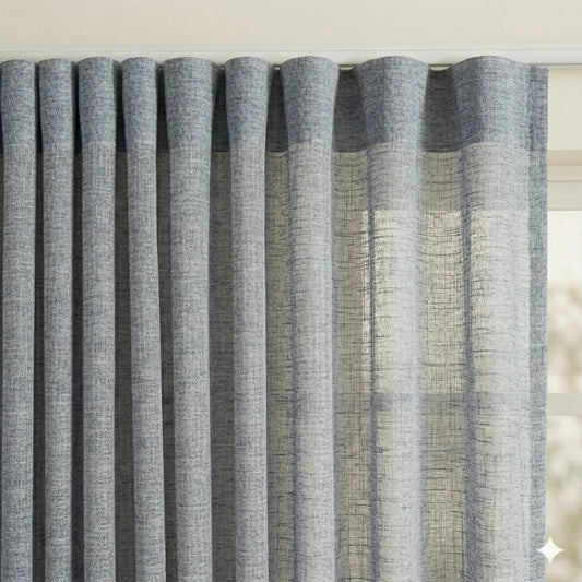 Textured gray curtain panel with a subtle pattern