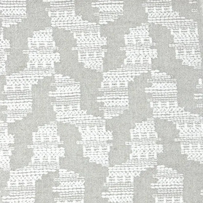 Gray and white geometric patterned fabric texture