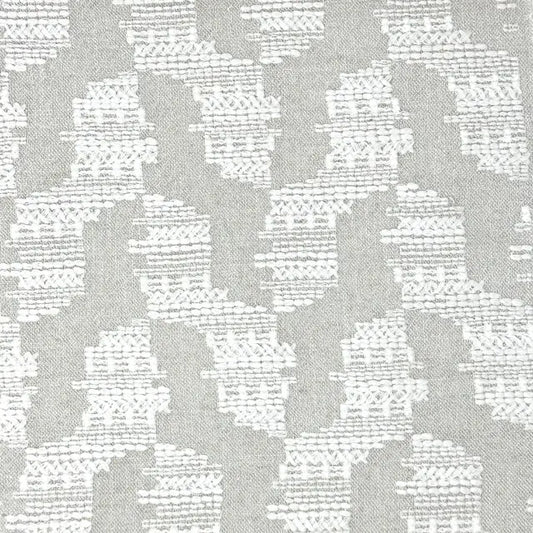Gray and white geometric patterned fabric texture