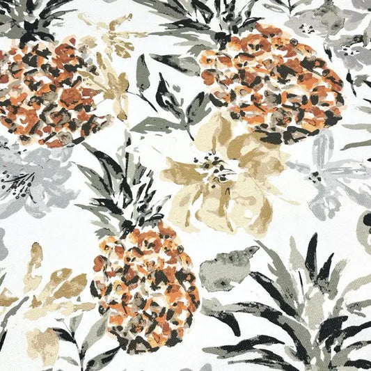 Linen fabric of pineapples and leaves on a white background