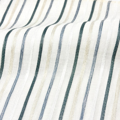Close-up of fabric with Vertical stripes in white, gray, and beige.