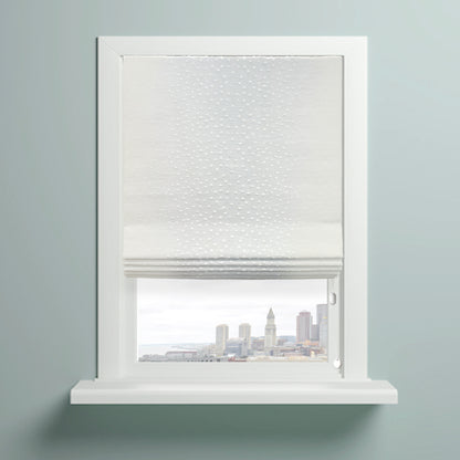 Elegant Embroidery Filigree Blend Linen flat roman shade on the window with a view of city.