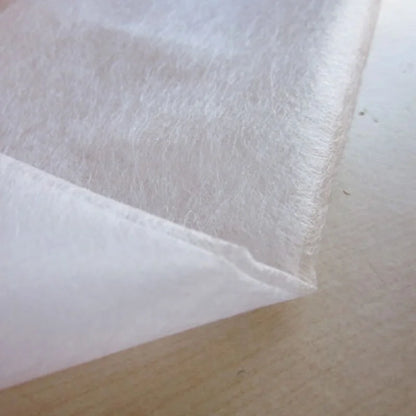 44" Wide Double-Sided Iron-On Interlining – Non-Woven Fusible Adhesive Web for Fabric Bonding & Sewing | CP1011