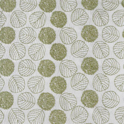 A close-up of a fabric or wallpaper pattern featuring sage green textured circles with leaf line drawings on a white background.