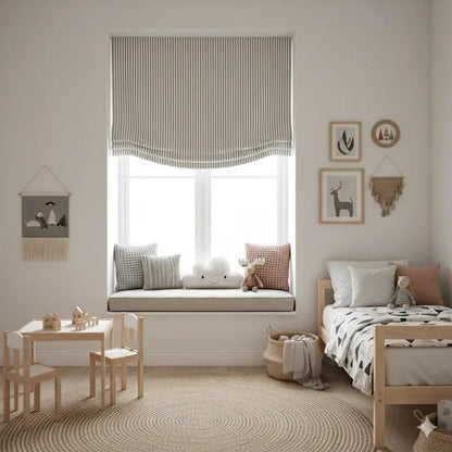 Children's room with a Blackout striped roman shade, a window seat, bed, and small table.