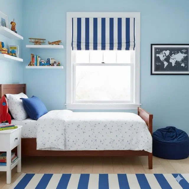 Children's bedroom with blue and white striped window shade, world map poster, and bean bag chair.