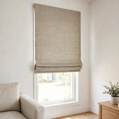 Natural double width linen flat Roman shade half raised in a modern farmhouse living room