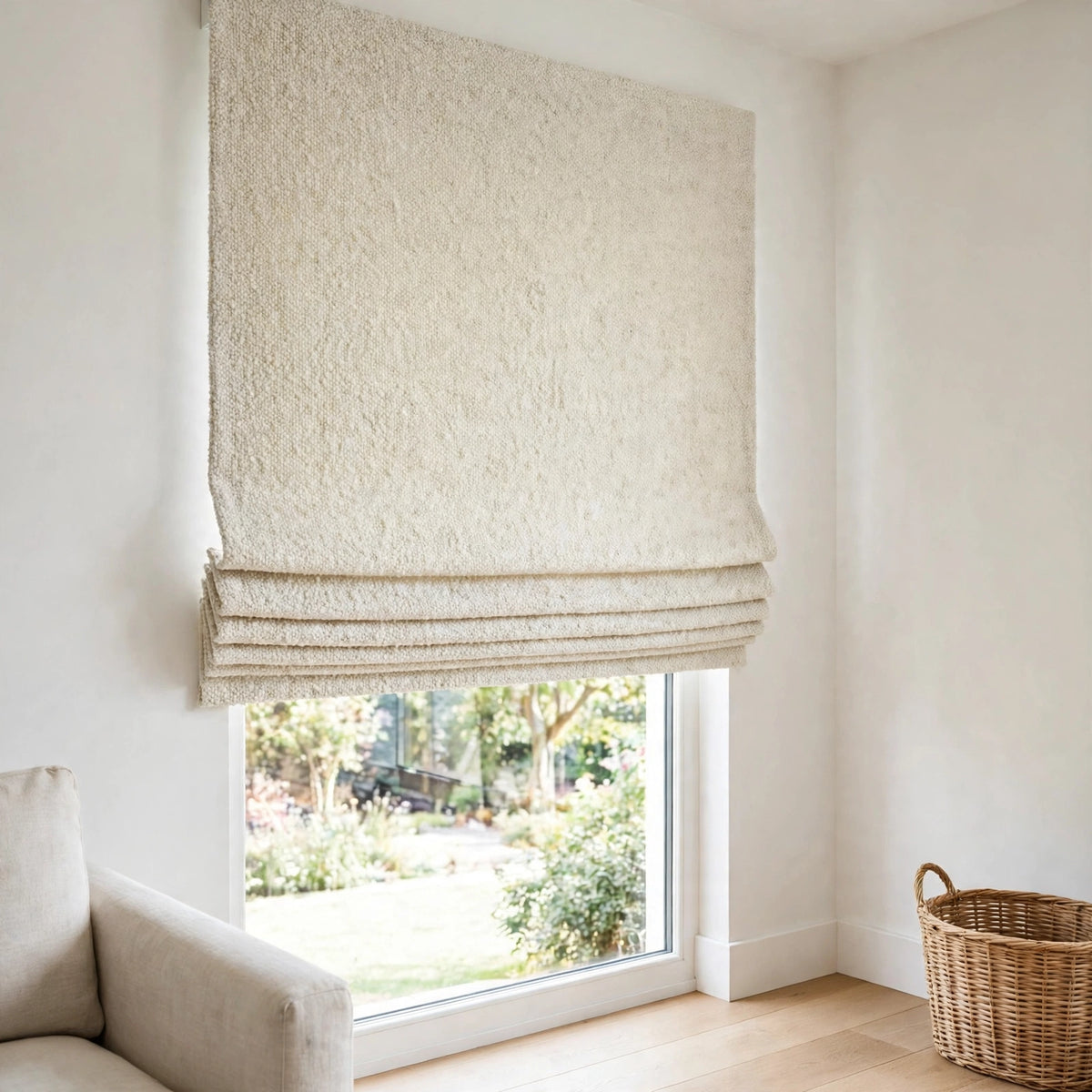 Ivory piling texture flat Roman shade half raised in a modern farmhouse living room corner