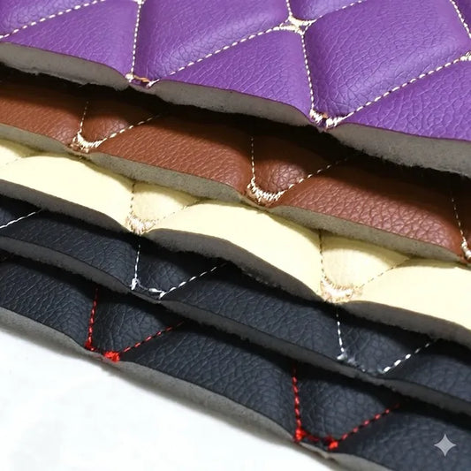 Stack of quilted leather samples in various colors on a white background