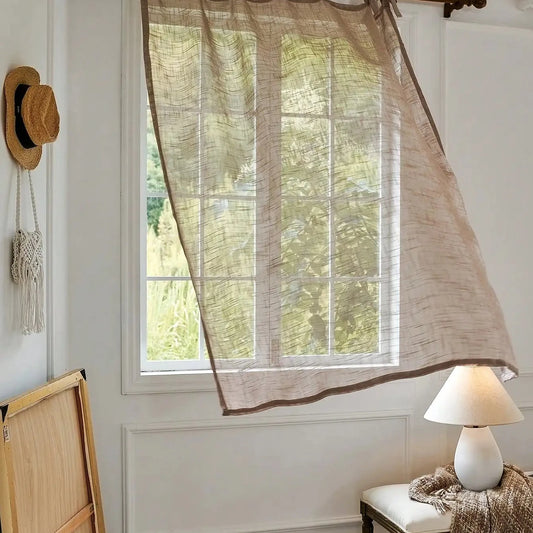 Brown linen-look sheer curtain with tie-top bows blowing in a bright window, CD1050
