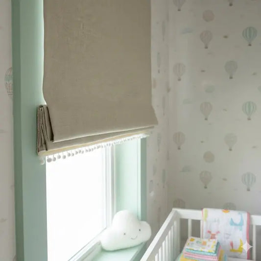 Nursery room with a window, crib, and decorative wallpaper.