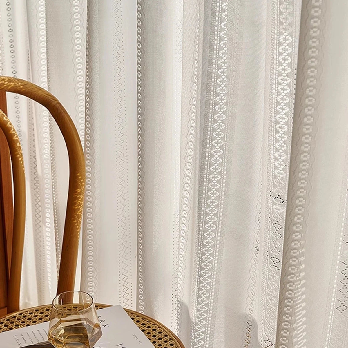 Close-up of white lace sheer curtain fabric with woven lace stripe pattern, CD1049