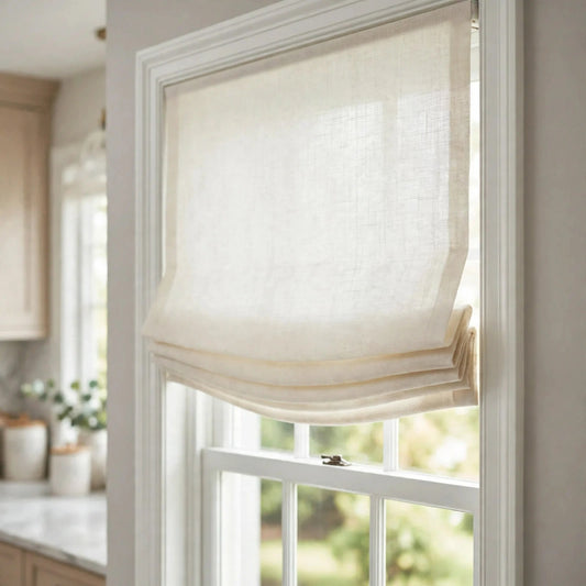 Ivory sheer linen relaxed Roman shade at an angle with soft compact folds