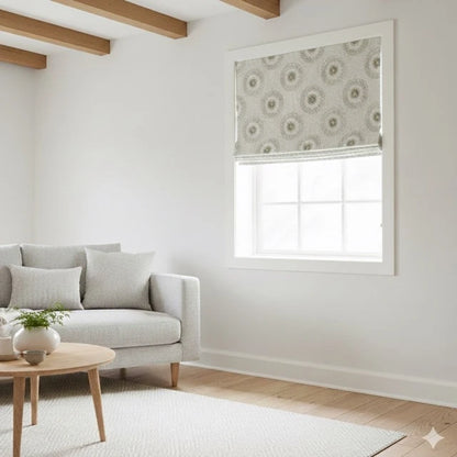 Living room with a gray sofa, wooden coffee table, and retro stitch sunburst patterned roman blind.