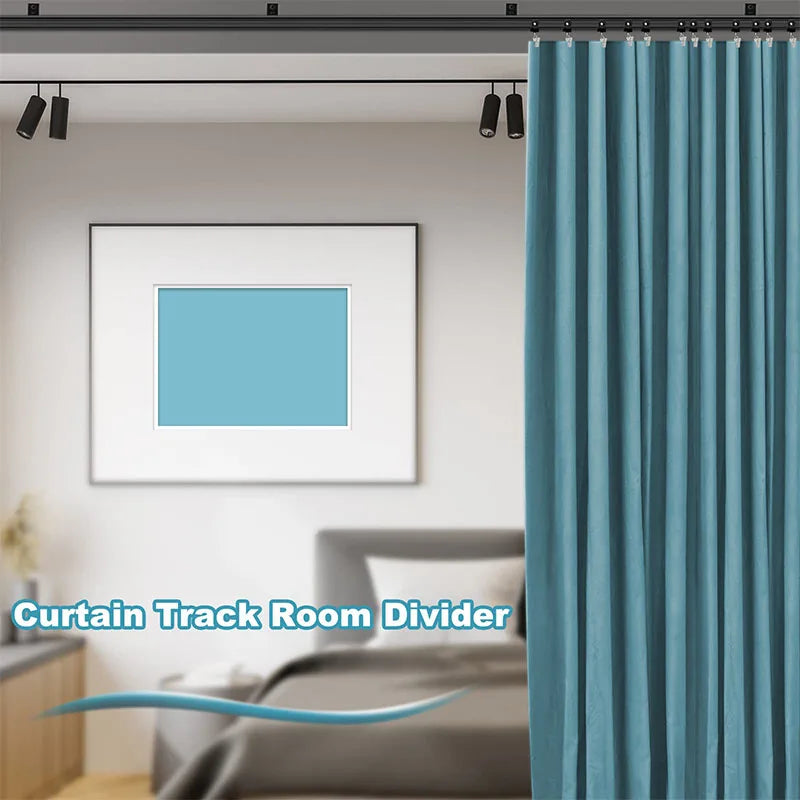 Black ceiling curtain track used as a room divider with a teal curtain