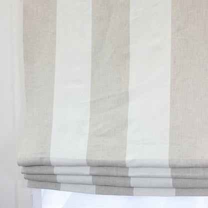 A 5-inch wide stripe Roman shade in a serene combination of beige and white colors. Crafted from 100% natural linen fabric, this window treatment exudes a timeless and elegant appeal, adding a touch of sophistication to any space.