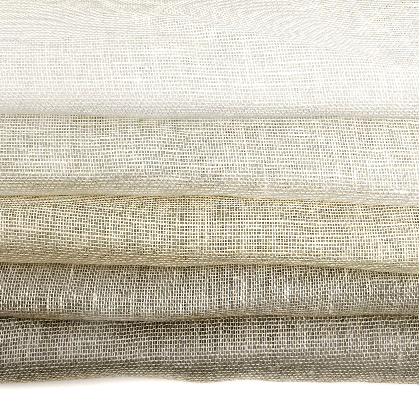 Rustic sheer linen fabric in natural tones, ideal for curtains and home decor.