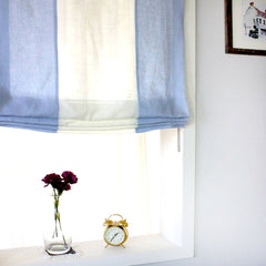 Blue and White Combo 100% natural linen relaxed roman shade on the window